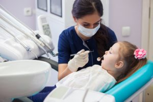Young girl at the dentist