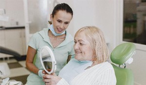 Woman at dentist for dentures
