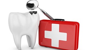 decayed tooth with first aid kit and dental mirror