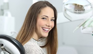 Female dental patient looking back and smiling