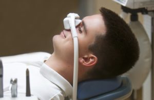 man receiving nitrous oxide sedation dentistry
