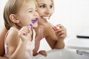 Family dentist in Wichita Falls places dental implant restorations.